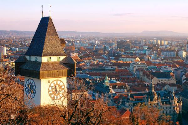 Graz bei sonnenuntergang vom Uhrturm aus
