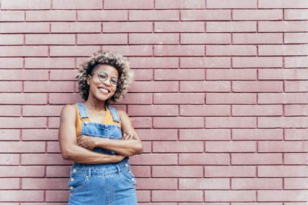 stylish smiling black woman with crossed arms wear 2022 01 18 23 46 02 utc