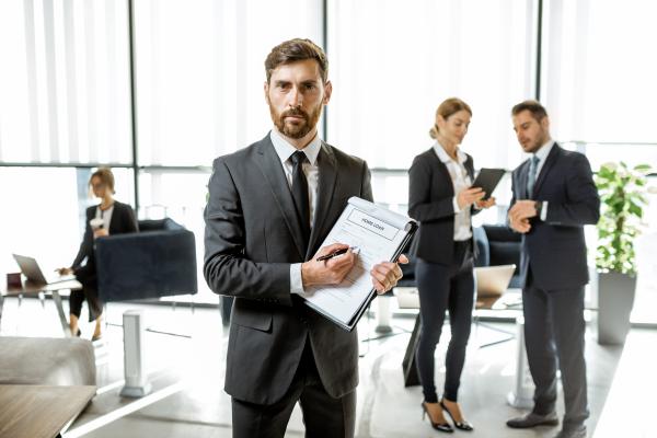 bank employee with home loan agreement 2023 11 27 05 32 20 utc