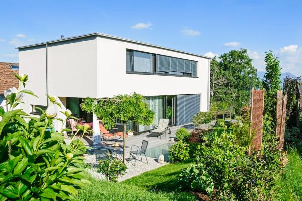 ImmoScout24-Umfrage: Im Grünen und im Eigentum lebt man glücklicher